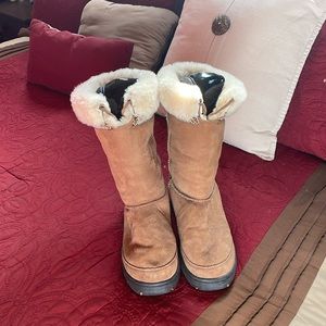 UGG Rare Boots with embroidery detail and leather tie. Excellent condition.